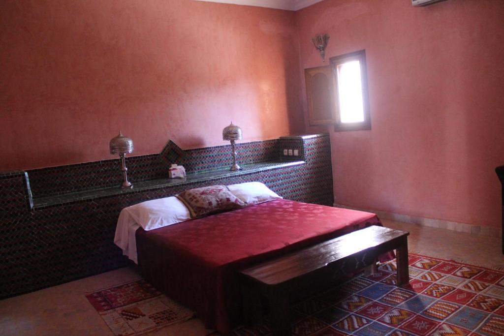 Letto o letti in una camera di Hotel Kasbah Azalay
