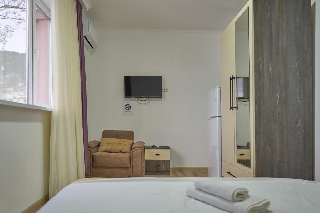 TV a/nebo společenská místnost v ubytování Hotel Lile • სასტუმრო ლილე