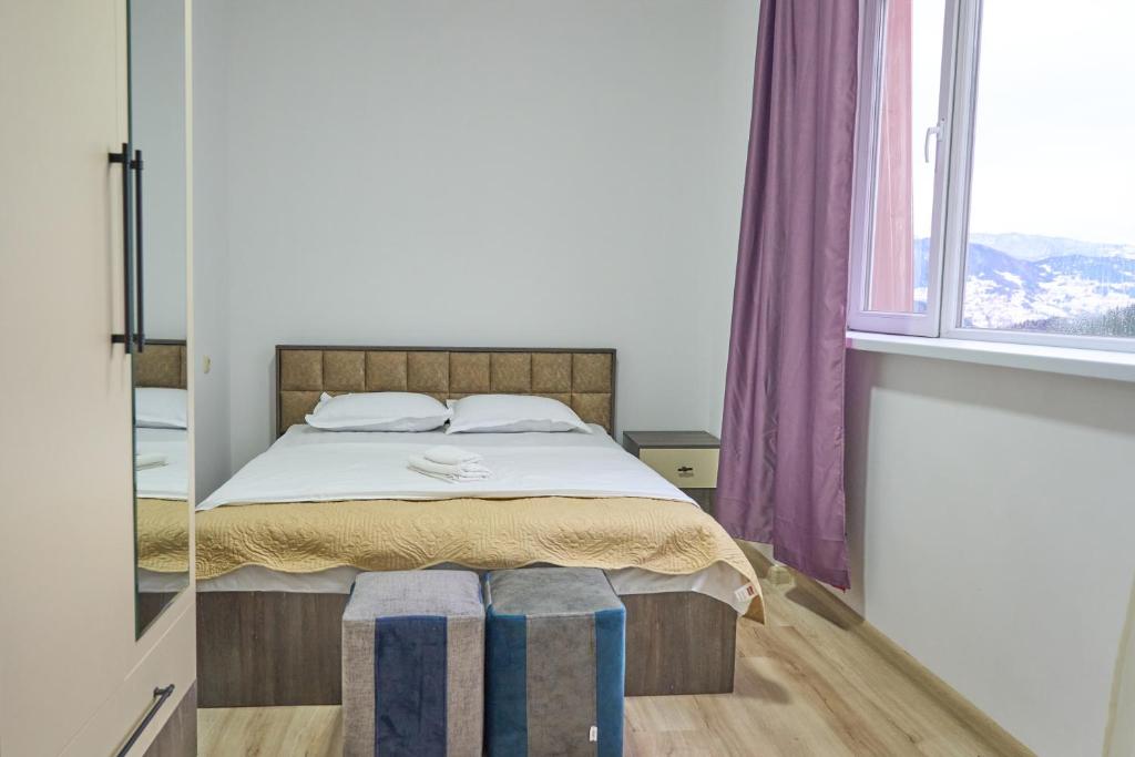Postel nebo postele na pokoji v ubytování Hotel Lile • სასტუმრო ლილე