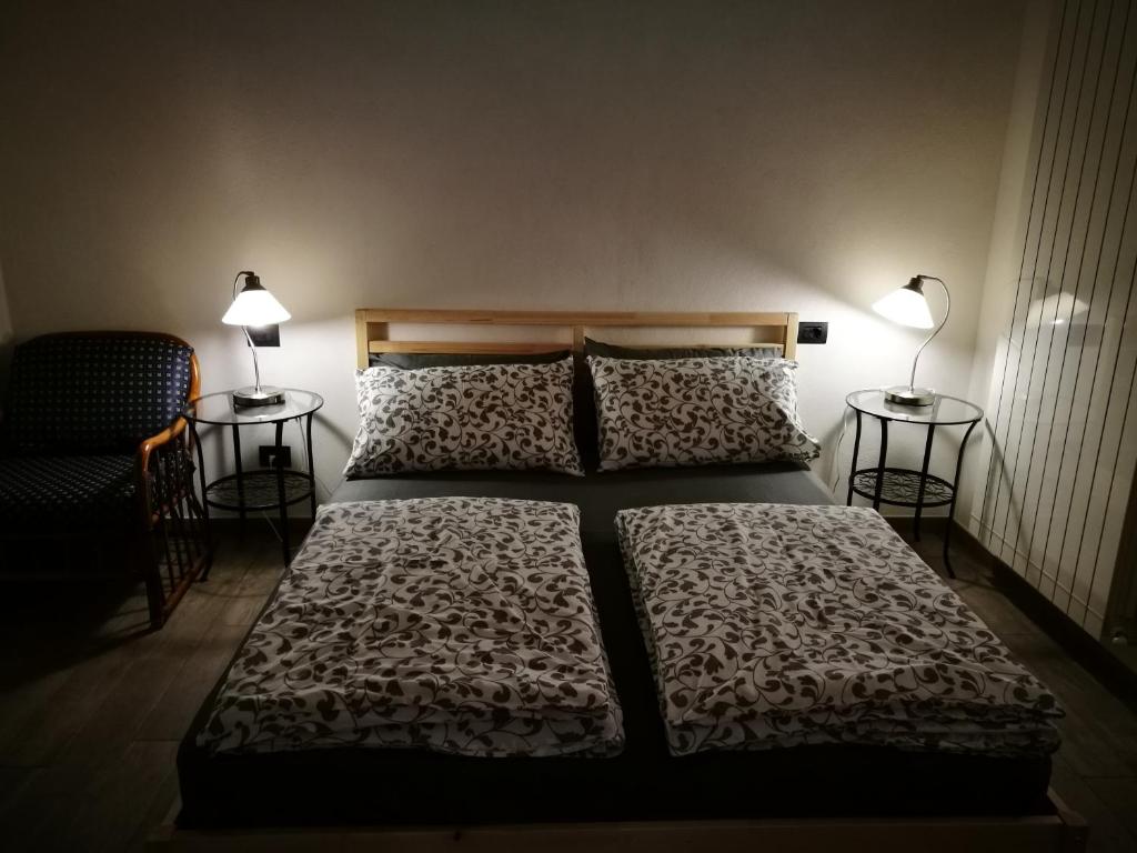 Postel nebo postele na pokoji v ubytování B&B La Terrazza Sui Fieschi