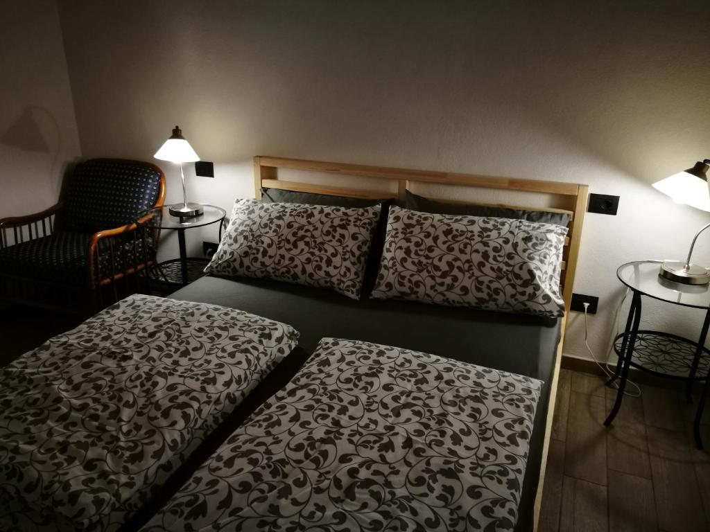Postel nebo postele na pokoji v ubytování B&B La Terrazza Sui Fieschi