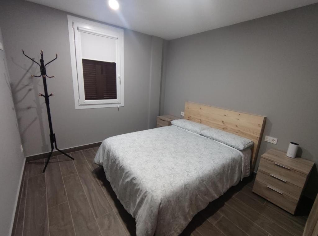 Postel nebo postele na pokoji v ubytování Casa Orensanz
