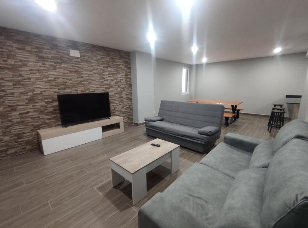 TV a/nebo společenská místnost v ubytování Casa Orensanz