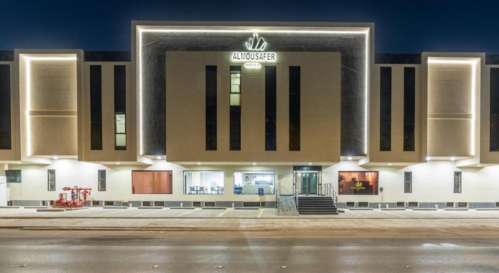 a building with a sign on the front of it at فندق المسافر in Riyadh