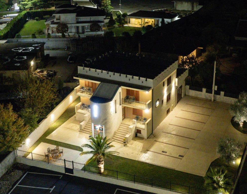 an aerial view of a house at night at Motel Zeta Lux in Mitrovići