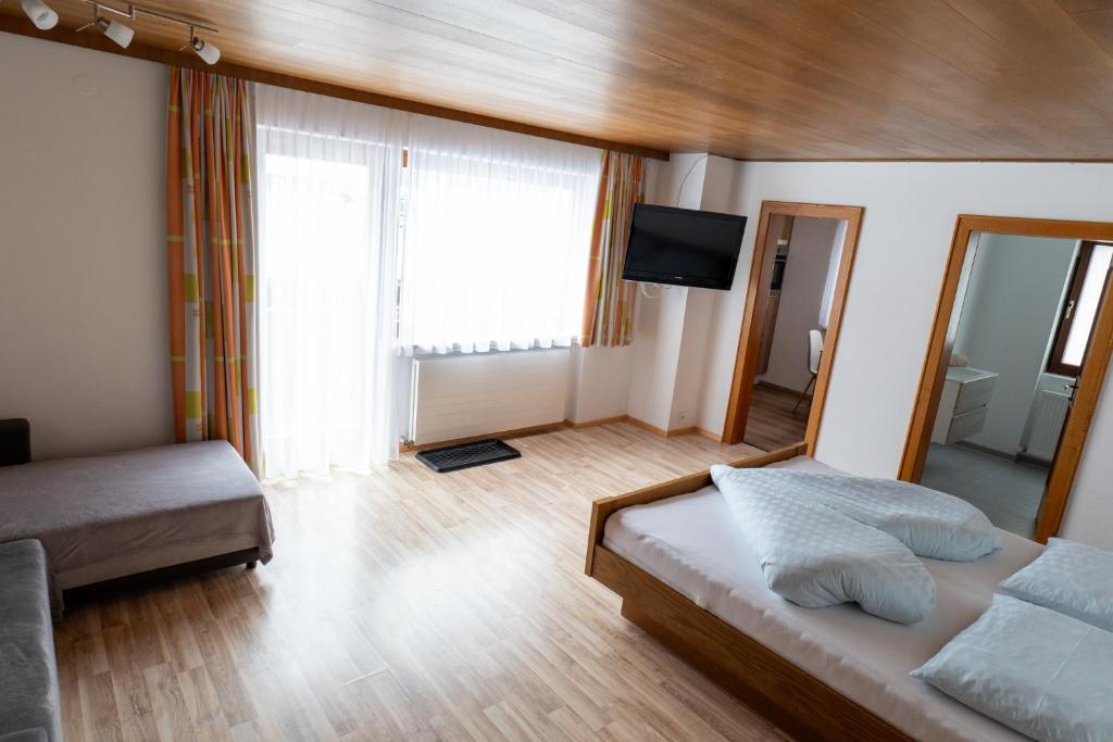 Postel nebo postele na pokoji v ubytování Haus Kappeller