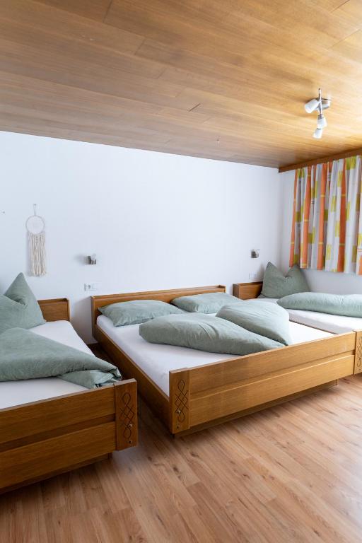 Postel nebo postele na pokoji v ubytování Haus Kappeller
