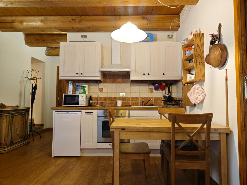 Kuchyň nebo kuchyňský kout v ubytování Hostdomus - Via Roma Suite