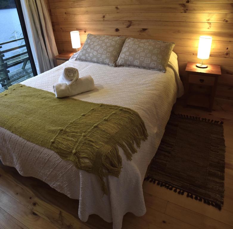 Postel nebo postele na pokoji v ubytování Cabañas Borgolafquen