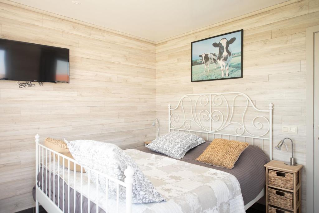 Postel nebo postele na pokoji v ubytování B&B De Kleine Prins