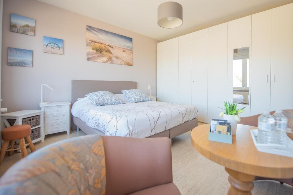 Postel nebo postele na pokoji v ubytování B&B De Kleine Prins