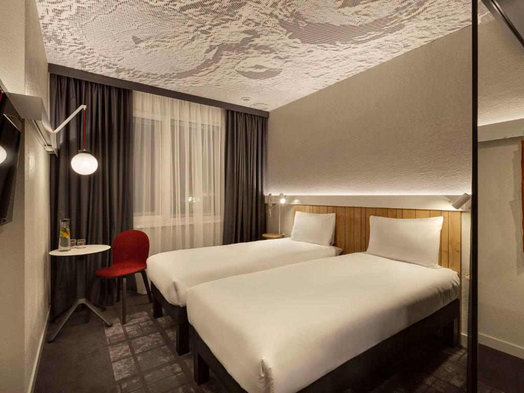 Postel nebo postele na pokoji v ubytování ibis Kyiv Beresteiska
