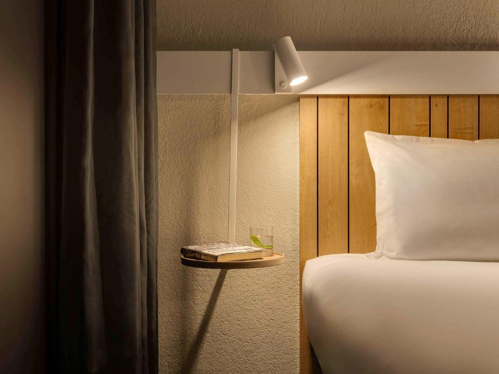 Postel nebo postele na pokoji v ubytování ibis Kyiv Beresteiska