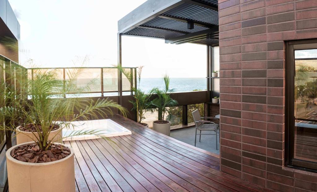 Uma varanda ou terraço em HCM - Hotel Corais de Manaira