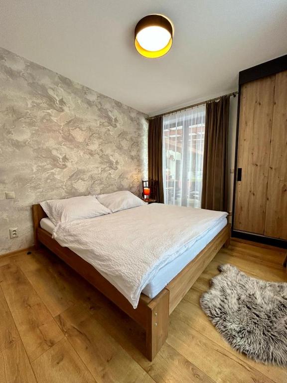 Postel nebo postele na pokoji v ubytování Apartmány Bobrík