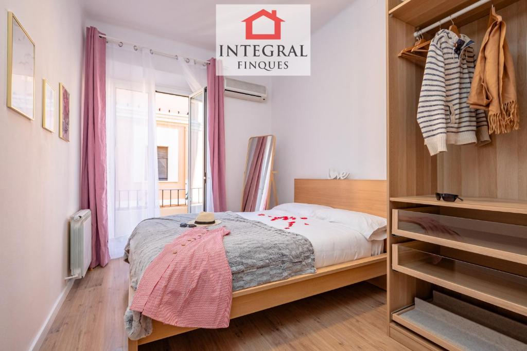 Postel nebo postele na pokoji v ubytování Meraki Palamós