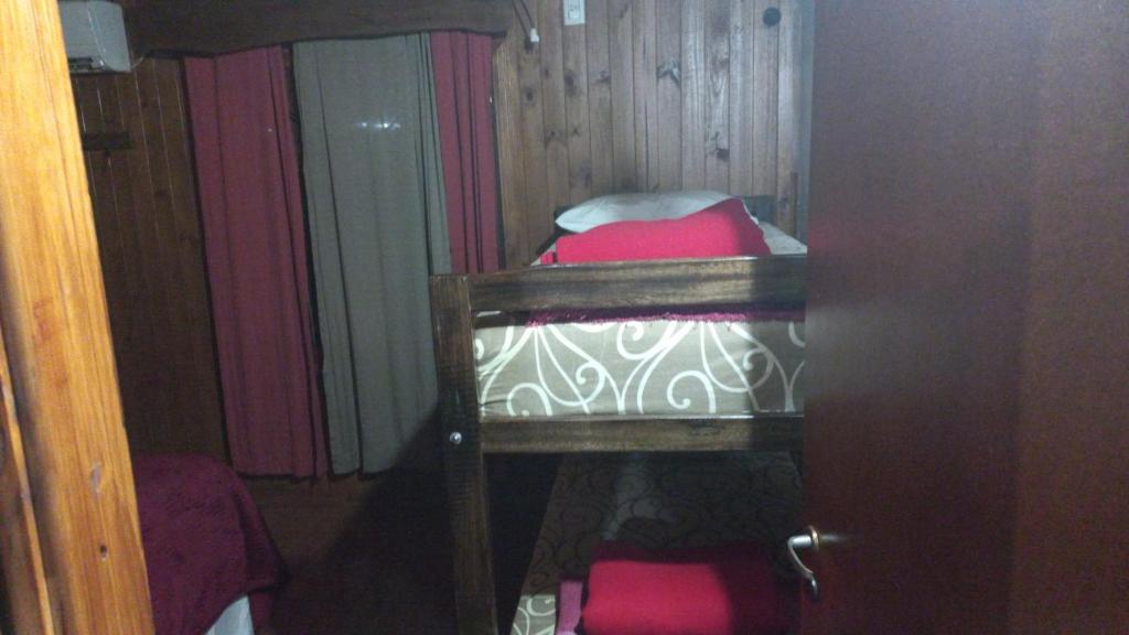 Postel nebo postele na pokoji v ubytování Cabañas Raíces Pampeanas