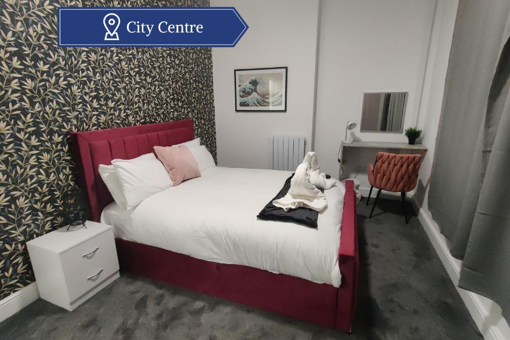 Ένα ή περισσότερα κρεβάτια σε δωμάτιο στο Modern 3-Bed Apartment with Kitchen in Town