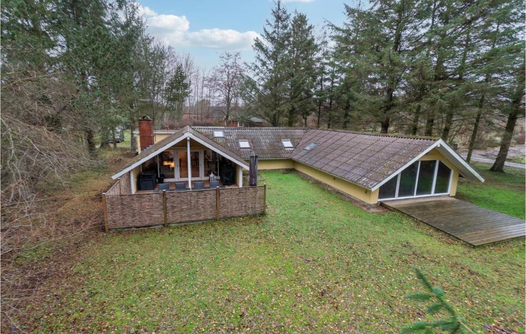 an overhead view of a house with a roof at Lovely Home In Aakirkeby With Kitchen in Vester Sømarken