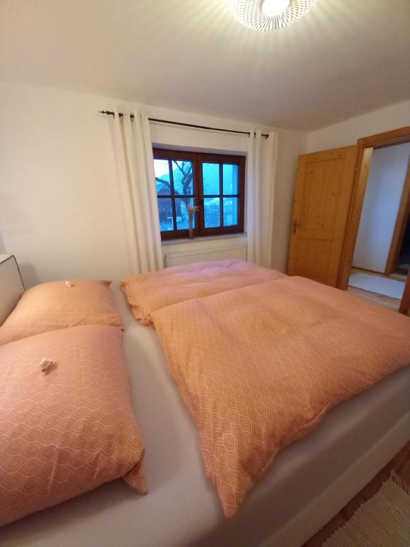 Postel nebo postele na pokoji v ubytování S'Rastl direkt mit Bergpanorama