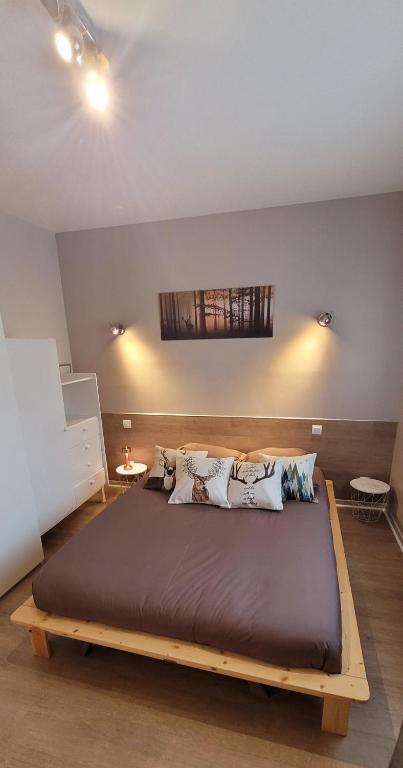 Postel nebo postele na pokoji v ubytování Le Petit Sapin