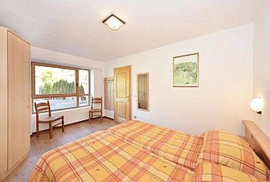 Letto o letti in una camera di Chalet La Ciaseta