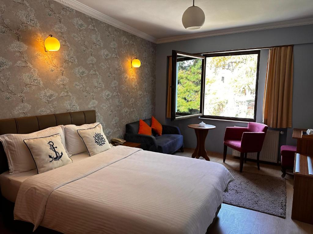 Ένα ή περισσότερα κρεβάτια σε δωμάτιο στο Lonca Butik Hotel