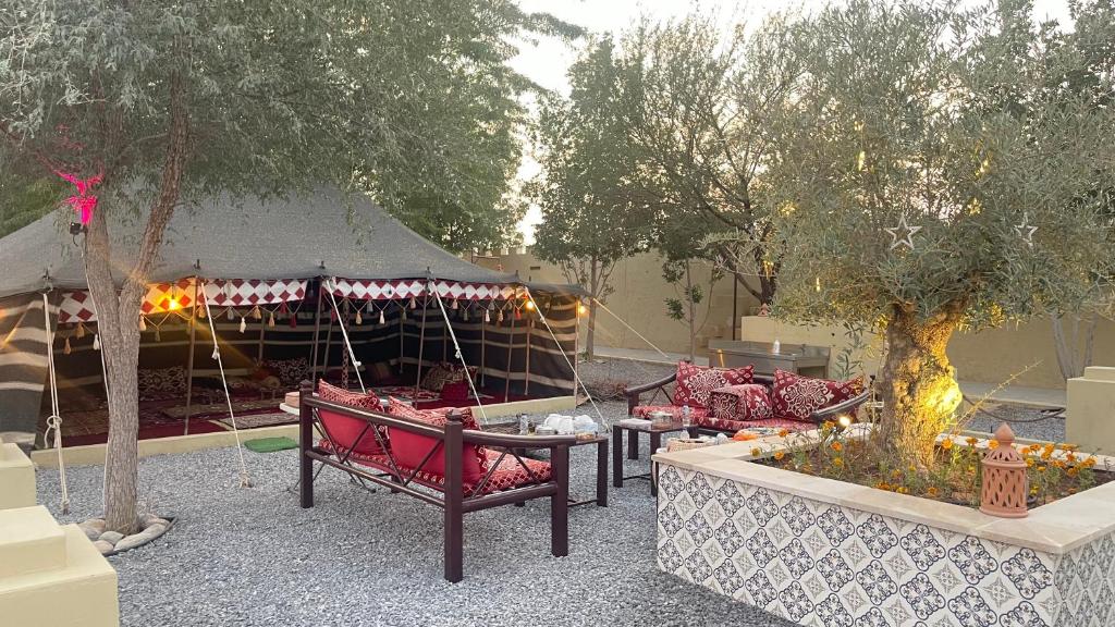 Zahrada ubytování Al Bait resort with private swimming pools -HRS stables
