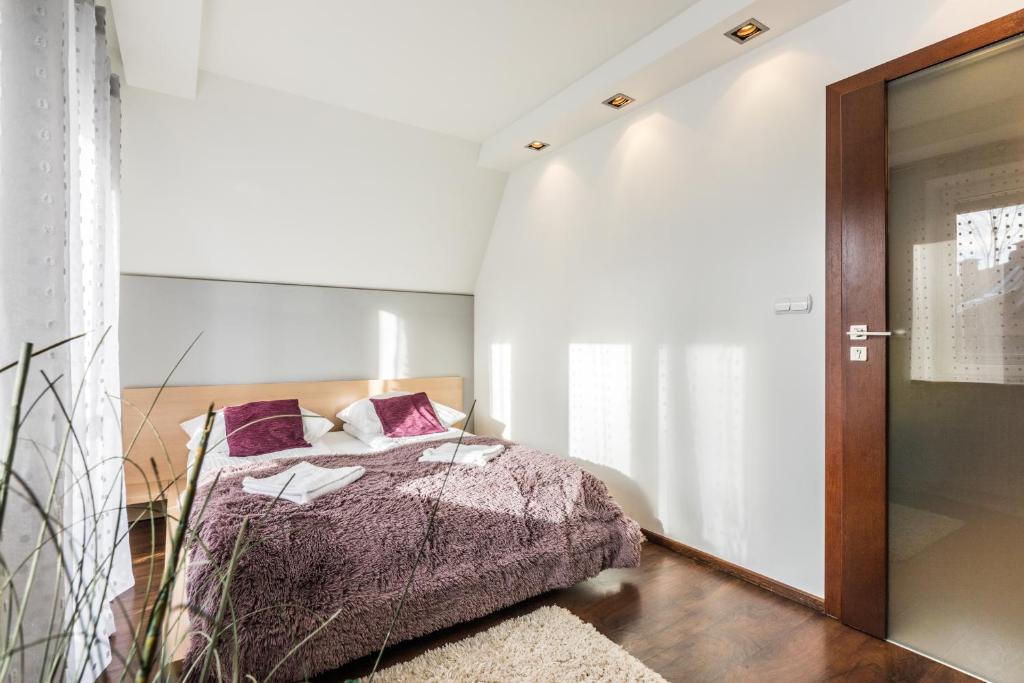 Posteľ alebo postele v izbe v ubytovaní Apartament Levante