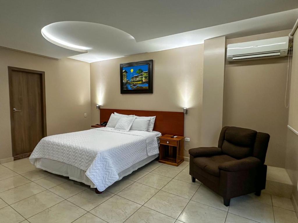 Postel nebo postele na pokoji v ubytování Hotel Bucaneiro