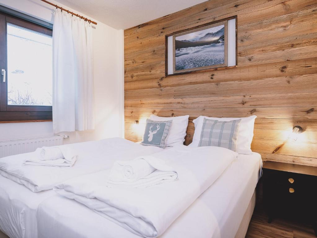 Posteľ alebo postele v izbe v ubytovaní Appartements Enzian by we rent