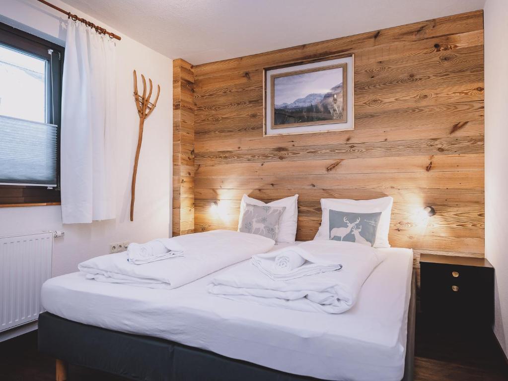 Posteľ alebo postele v izbe v ubytovaní Appartements Enzian by we rent