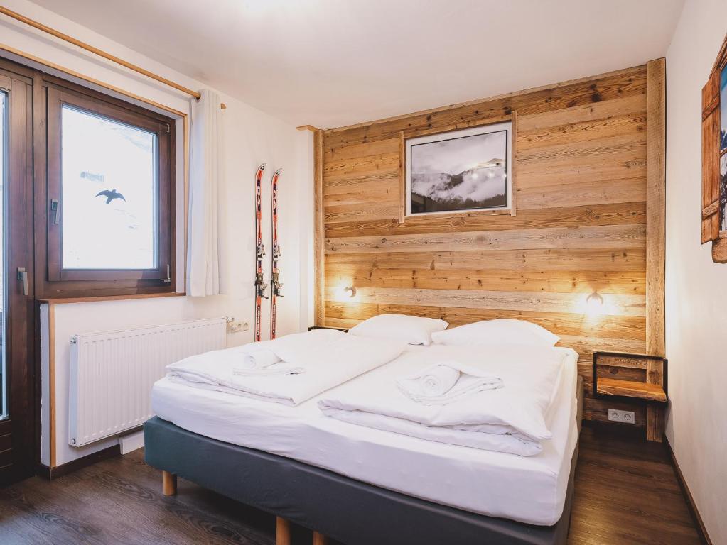 Posteľ alebo postele v izbe v ubytovaní Appartements Enzian by we rent