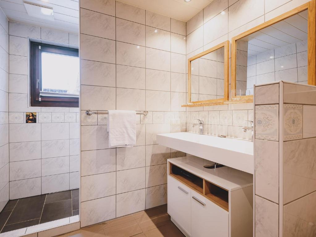 Kúpeľňa v ubytovaní Appartements Enzian by we rent