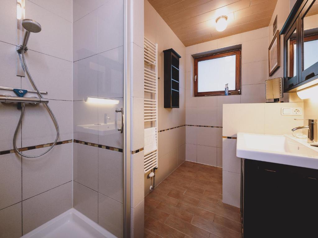 Kúpeľňa v ubytovaní Appartements Enzian by we rent