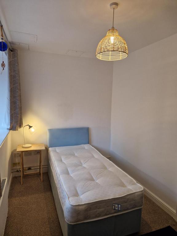 Postel nebo postele na pokoji v ubytování Apartment Near Norwich City