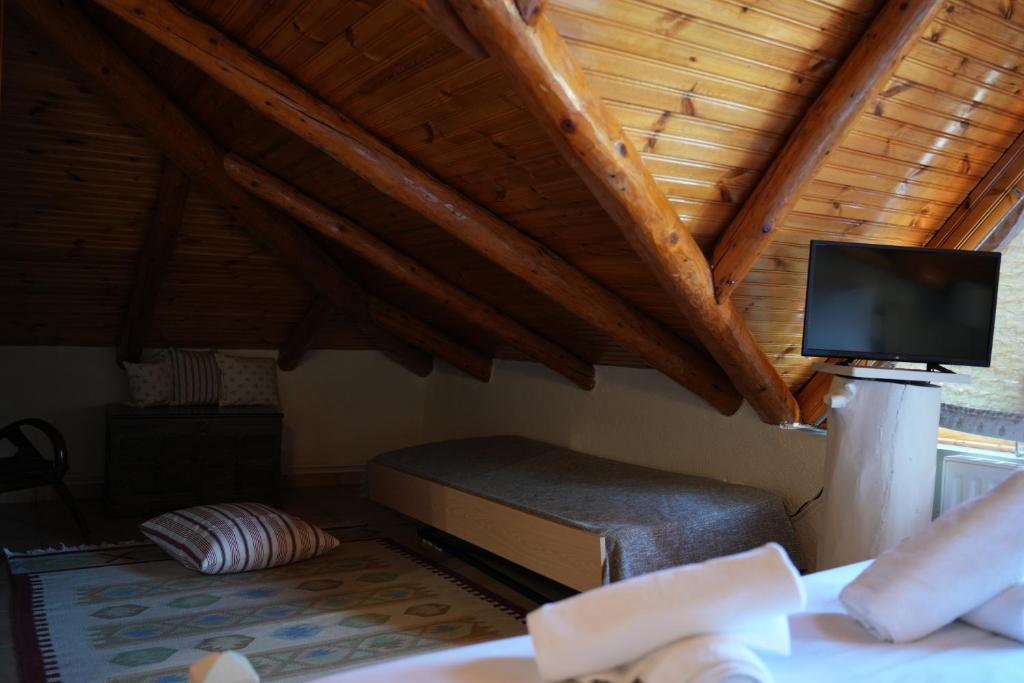TV a/nebo společenská místnost v ubytování Guesthouse Doma est 1991