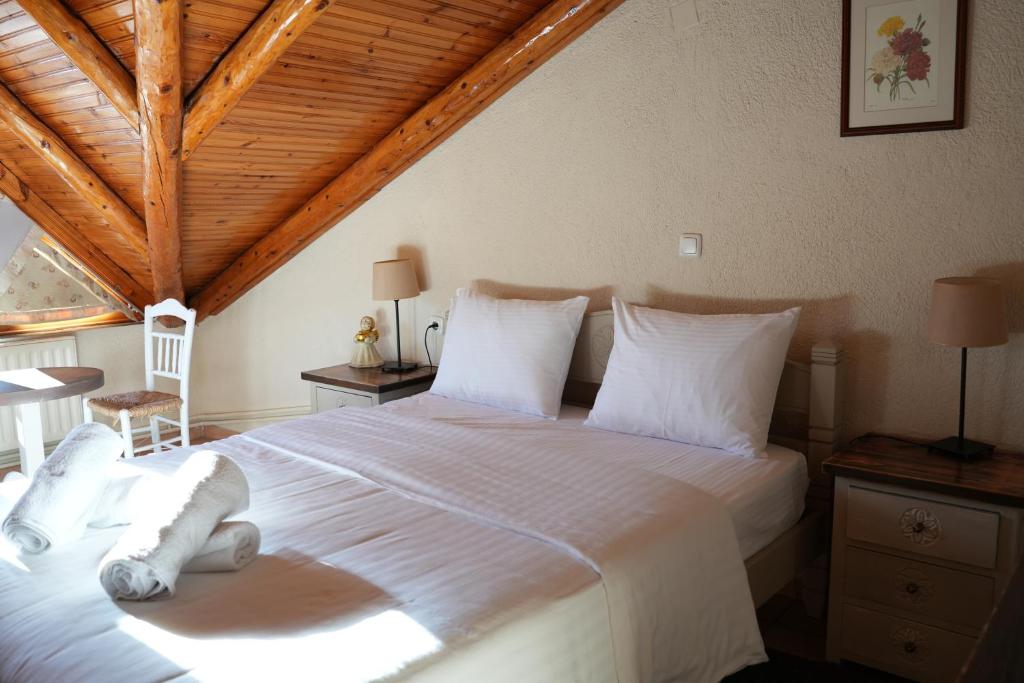 Postel nebo postele na pokoji v ubytování Guesthouse Doma est 1991