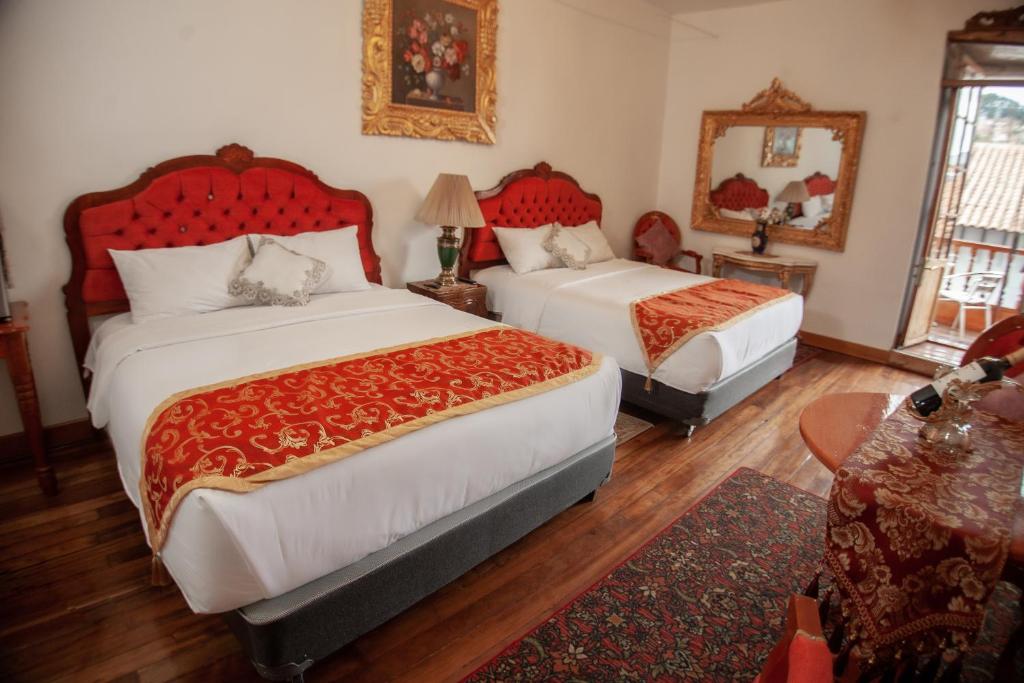 Posteľ alebo postele v izbe v ubytovaní Casona Corrales Hotel Boutique