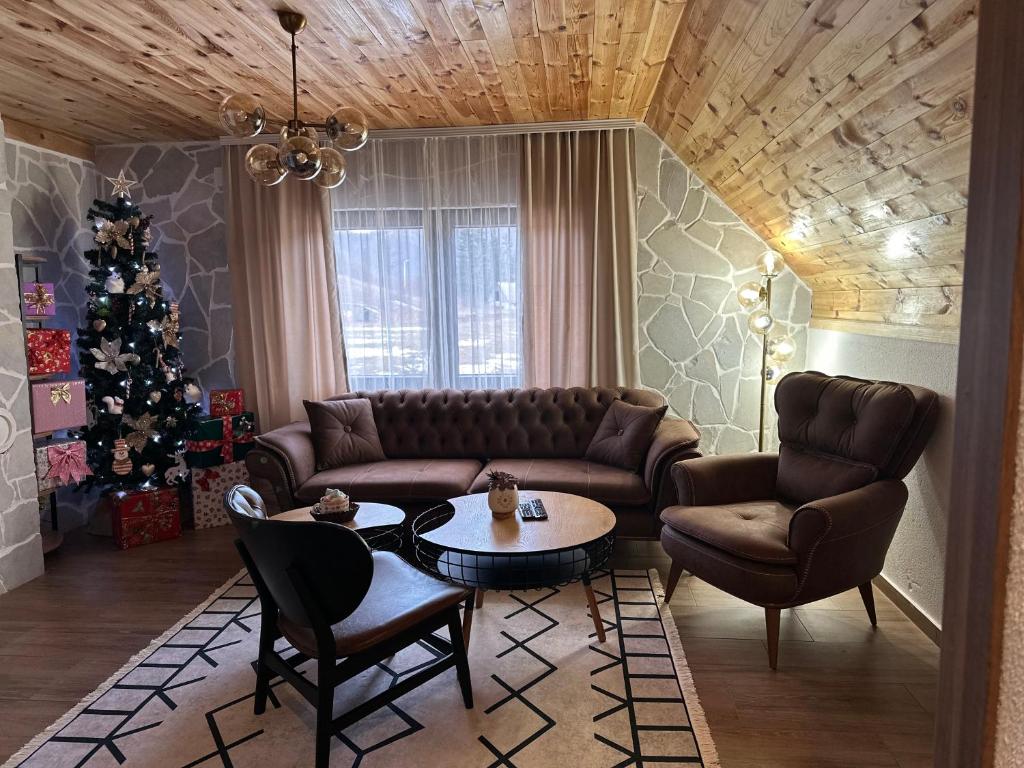 Posezení v ubytování Blue Village Lux