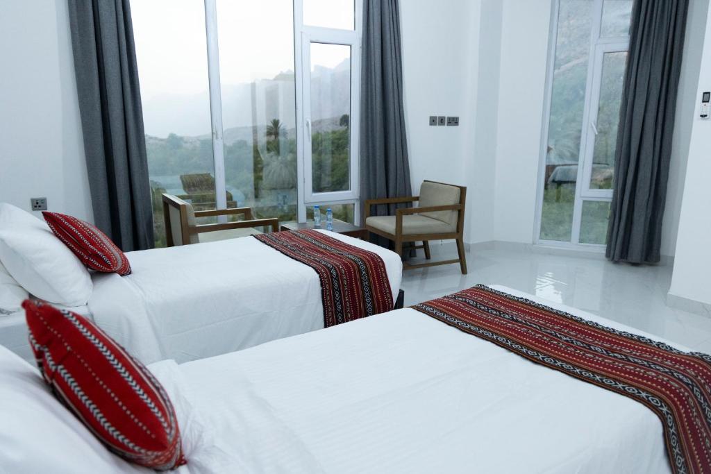 Postel nebo postele na pokoji v ubytování Hadash guest house