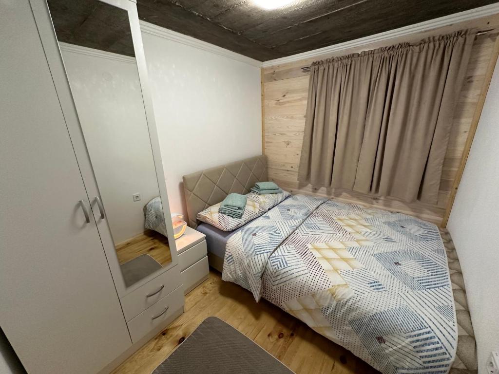 Postel nebo postele na pokoji v ubytování Blue Village Lux