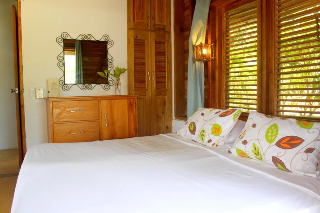 Cama o camas de una habitación en Clave Verde Ecolodge