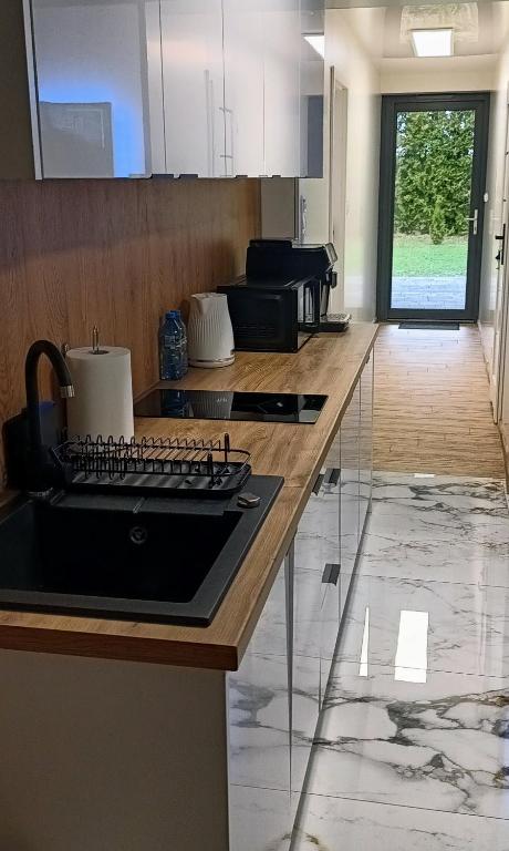 Kuchnia lub aneks kuchenny w obiekcie Lumax