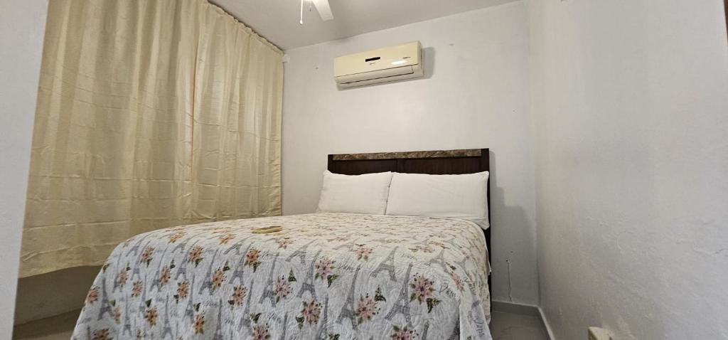 Postel nebo postele na pokoji v ubytování Discovery Beach Apartments