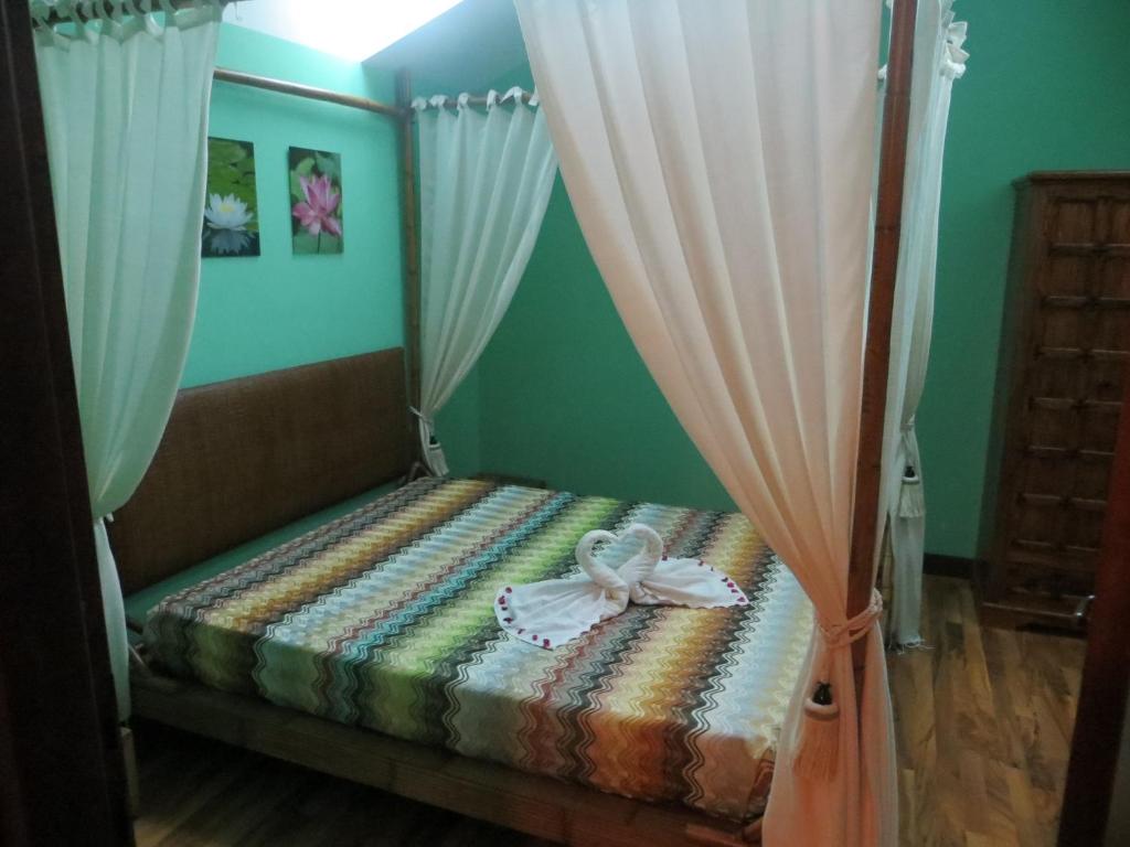 Postel nebo postele na pokoji v ubytování Borgo Lamurese
