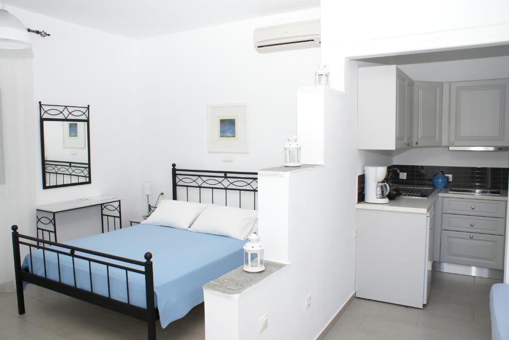 Kuchyň nebo kuchyňský kout v ubytování Petra & Fos Studios and Rooms
