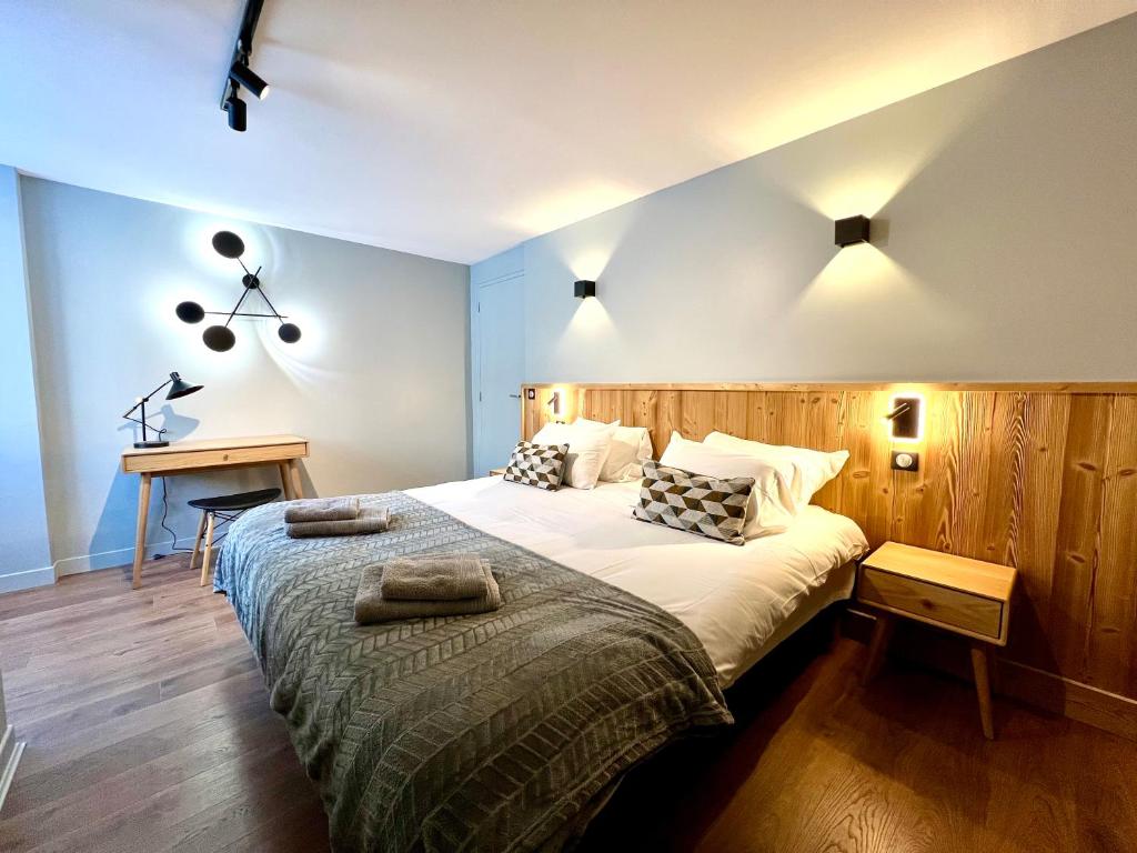 Postel nebo postele na pokoji v ubytování Appartements Chalet Lauranoure Centre Station