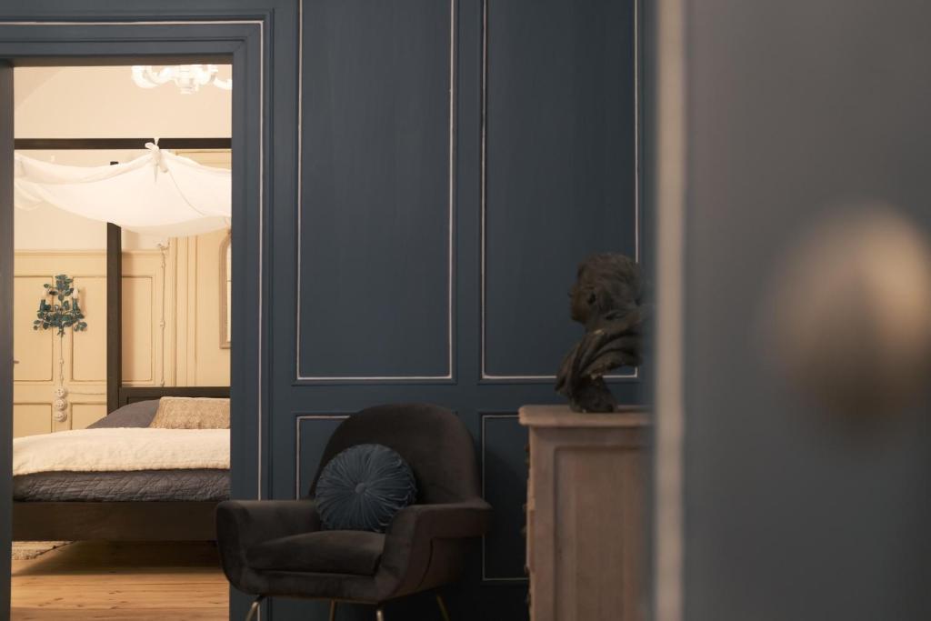 Postel nebo postele na pokoji v ubytování La Cles Deluxe Suites