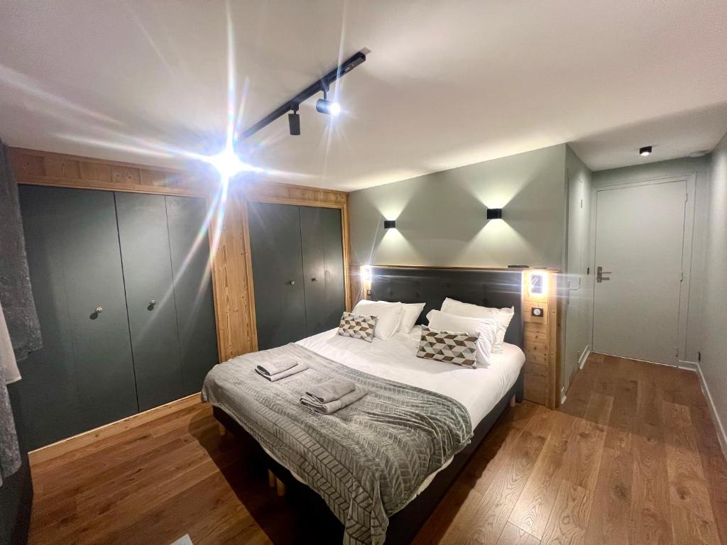 Postel nebo postele na pokoji v ubytování Appartements Chalet Lauranoure Centre Station